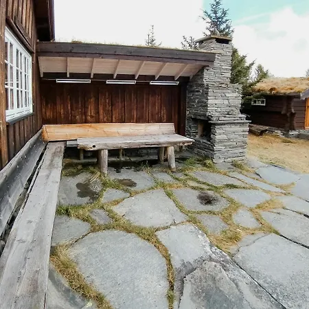 Historic Log By Rondane National Park * Laargard
