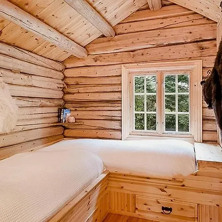 Historic Log By Rondane National Park * Laargard