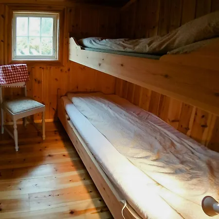 Historic Log By Rondane National Park Laargard